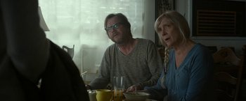 Movie still from “The Circle” (2017), directed by James Ponsoldt – A man and a woman sitting at a dinner table; Medium shot, Over the shoulder angle