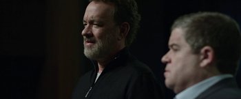 Movie still from “The Circle” (2017), directed by James Ponsoldt – A man in a black jacket and a woman in a black jacket; Close Up shot, Over the shoulder angle