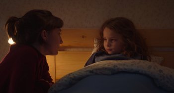 Movie still from “Petite Maman” (2021), directed by Céline Sciamma – Close Up shot, Over the shoulder angle