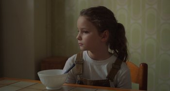 Movie still from “Petite Maman” (2021), directed by Céline Sciamma – Close Up shot, Over the shoulder angle