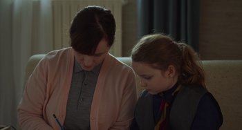 Movie still from “Petite Maman” (2021), directed by Céline Sciamma – Medium shot, Over the shoulder angle