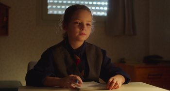 Movie still from “Petite Maman” (2021), directed by Céline Sciamma – Close Up shot, Over the shoulder angle