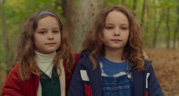 Movie still from “Petite Maman” (2021), directed by Céline Sciamma – Close Up shot, High angle