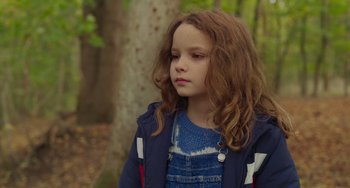 Movie still from “Petite Maman” (2021), directed by Céline Sciamma – Close Up shot, Over the shoulder angle