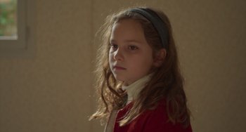 Movie still from “Petite Maman” (2021), directed by Céline Sciamma – Close Up shot, High angle