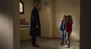 Movie still from “Petite Maman” (2021), directed by Céline Sciamma – Medium shot, Low angle