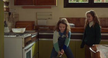 Movie still from “Petite Maman” (2021), directed by Céline Sciamma – Medium shot, High angle