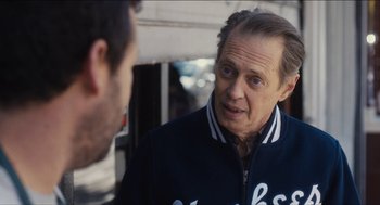 Movie still from “The Cobbler” (2014), directed by Tom McCarthy – A man talking to another man in front of a building; Close Up shot, Over the shoulder angle