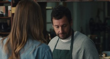 Movie still from “The Cobbler” (2014), directed by Tom McCarthy – A man and a woman are talking in a kitchen; Close Up shot, Over the shoulder angle