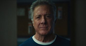 Movie still from “The Cobbler” (2014), directed by Tom McCarthy – An older man with gray hair is looking at the camera; Close Up shot, Low angle