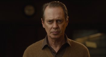 Movie still from “The Cobbler” (2014), directed by Tom McCarthy – A person wearing a sweater; Close Up shot, Low angle