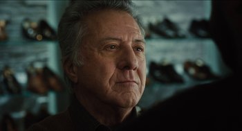 Movie still from “The Cobbler” (2014), directed by Tom McCarthy – An older man with grey hair looking at the camera; Close Up shot, Low angle