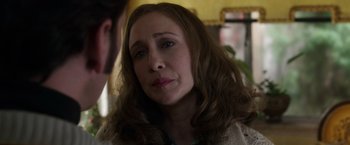 Movie still from “The Conjuring 2” (2016), directed by James Wan – A person with long brown hair; Close Up shot, Over the shoulder angle