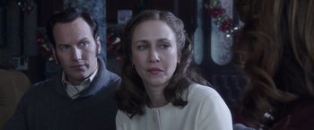 Movie still from “The Conjuring 2” (2016), directed by James Wan – A person with long hair; Close Up shot, Over the shoulder angle