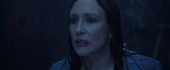 Movie still from “The Conjuring 2” (2016), directed by James Wan – A person with wet hair; Close Up shot, Over the shoulder angle