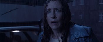 Movie still from “The Conjuring 2” (2016), directed by James Wan – A person with wet hair; Close Up shot, High angle