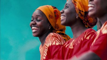 Movie still from “The Constant Gardener” (2005), directed by Fernando Meirelles – A couple of women standing next to each other; Medium shot, Low angle