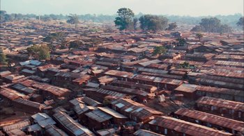 Movie still from “The Constant Gardener” (2005), directed by Fernando Meirelles – An aerial view of a large city with lots of buildings; Extreme Wide shot, High angle