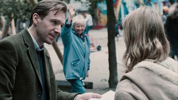 Movie still from “The Constant Gardener” (2005), directed by Fernando Meirelles – A man and a woman are talking to each other outside; Medium shot, Over the shoulder angle