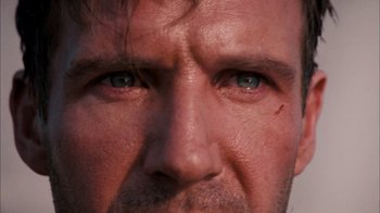 Movie still from “The Constant Gardener” (2005), directed by Fernando Meirelles – A person's face with blue eyes; Extreme Close Up shot, Low angle