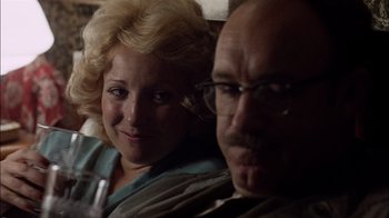 Movie still from “The Conversation” (1974), directed by Francis Ford Coppola – A man and a woman sitting next to each other on a couch; Close Up shot, Over the shoulder angle