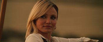 Movie still from “The Counselor” (2013), directed by Ridley Scott – A person with long blonde hair; Close Up shot, Over the shoulder angle