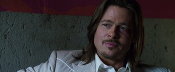 Movie still from “The Counselor” (2013), directed by Ridley Scott – A person with long hair; Close Up shot, Over the shoulder angle