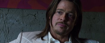 Movie still from “The Counselor” (2013), directed by Ridley Scott – A person with long hair; Close Up shot, Over the shoulder angle