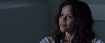 Movie still from “The Counselor” (2013), directed by Ridley Scott – A person wearing a white shirt; Close Up shot, Over the shoulder angle