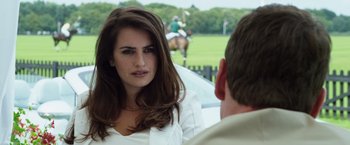 Movie still from “The Counselor” (2013), directed by Ridley Scott – A woman in a white dress talking to a man in a polo shirt; Close Up shot, Over the shoulder angle