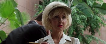 Movie still from “The Counselor” (2013), directed by Ridley Scott – A woman with blonde hair wearing a hat; Close Up shot, Low angle