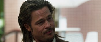 Movie still from “The Counselor” (2013), directed by Ridley Scott – A person with long hair; Close Up shot, Over the shoulder angle