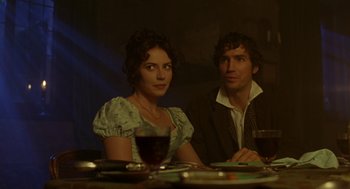 Movie still from “The Count of Monte Cristo” (2002), directed by Kevin Reynolds – A man and a woman sitting at a dinner table; Medium shot, Over the shoulder angle