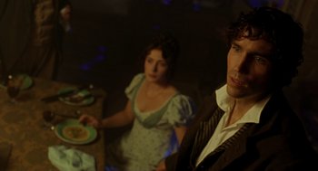 Movie still from “The Count of Monte Cristo” (2002), directed by Kevin Reynolds – A man and a woman sitting at a dinner table; Close Up shot, Over the shoulder angle