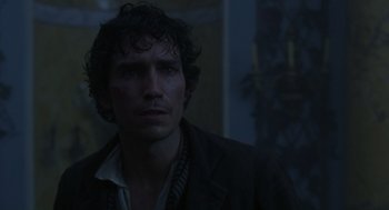 Movie still from “The Count of Monte Cristo” (2002), directed by Kevin Reynolds – A person wearing a jacket; Close Up shot, Over the shoulder angle