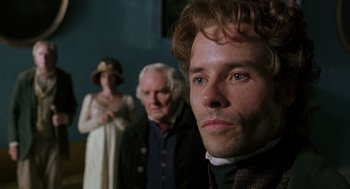 Movie still from “The Count of Monte Cristo” (2002), directed by Kevin Reynolds – A man and two women standing next to each other in a room; Close Up shot, Over the shoulder angle
