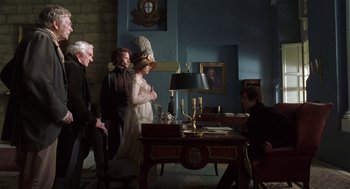 Movie still from “The Count of Monte Cristo” (2002), directed by Kevin Reynolds – A group of people standing around a table; Wide shot, High angle