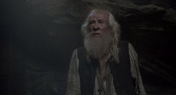 Movie still from “The Count of Monte Cristo” (2002), directed by Kevin Reynolds – An old man with long white hair and a white beard; Close Up shot, Low angle