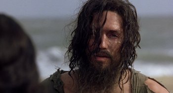 Movie still from “The Count of Monte Cristo” (2002), directed by Kevin Reynolds – A person with long hair and a beard; Close Up shot, Low angle