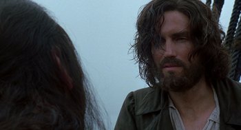 Movie still from “The Count of Monte Cristo” (2002), directed by Kevin Reynolds – A man with long hair and a long beard; Close Up shot, Over the shoulder angle
