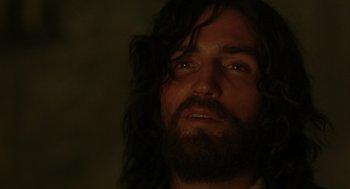 Movie still from “The Count of Monte Cristo” (2002), directed by Kevin Reynolds – A person with long hair and a beard; Close Up shot, High angle