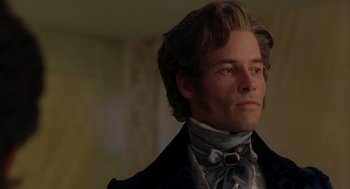 Movie still from “The Count of Monte Cristo” (2002), directed by Kevin Reynolds – A person wearing a suit and tie; Close Up shot, Over the shoulder angle