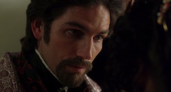 Movie still from “The Count of Monte Cristo” (2002), directed by Kevin Reynolds – A person wearing a suit and tie; Close Up shot, Over the shoulder angle