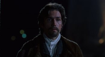 Movie still from “The Count of Monte Cristo” (2002), directed by Kevin Reynolds – A person wearing a fur coat; Close Up shot, Over the shoulder angle