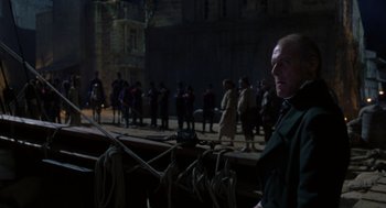 Movie still from “The Count of Monte Cristo” (2002), directed by Kevin Reynolds – A group of people standing on a street; Medium shot, Over the shoulder angle