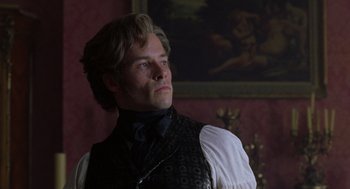Movie still from “The Count of Monte Cristo” (2002), directed by Kevin Reynolds – A person wearing a suit and tie; Close Up shot, Low angle