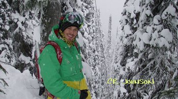 Movie still from “The Crash Reel” (2013), directed by Lucy Walker – A man standing in the snow next to a forest; Wide shot, High angle