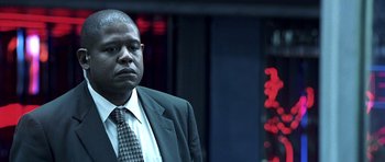 Movie still from “Phone Booth” (2002), directed by Joel Schumacher – A man in a suit and a tie; Close Up shot, Low angle