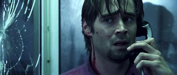 Movie still from “Phone Booth” (2002), directed by Joel Schumacher – A person with blood on his face; Close Up shot, Low angle