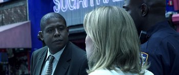 Movie still from “Phone Booth” (2002), directed by Joel Schumacher – A man and a woman are talking to each other; Close Up shot, Over the shoulder angle